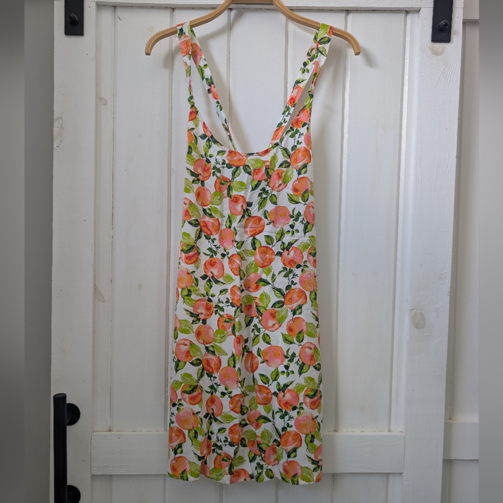BCBGMaxAzria Knotted Sundress Featuring A Peach Print And Crisscross Straps